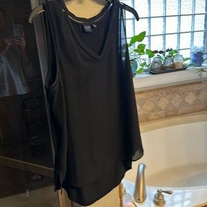 Black sleeveless tunic. Kaari blue. Great condition